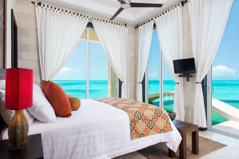 Guest oceanfront bedroom at Villa Balinese Turks and Caicos