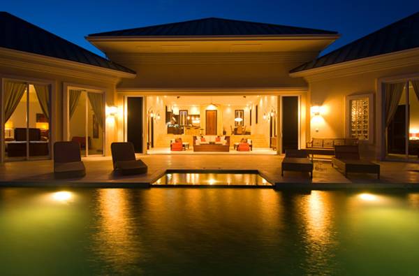 Villa Balinese poolside at night Turks and Caicos