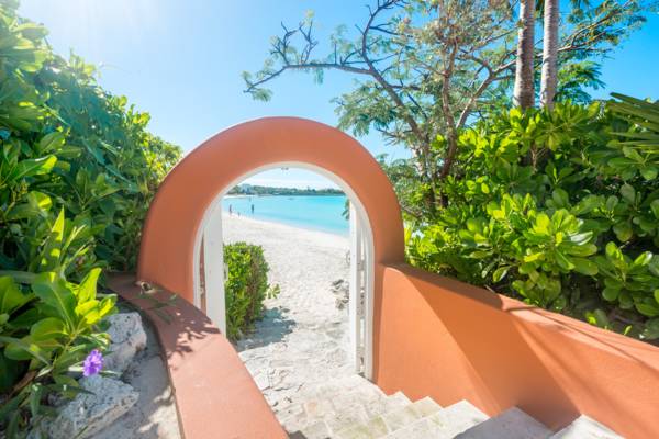 Gated beach entry at La Koubba estate villa in Providenciales