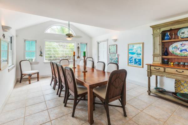 Formal dining room seats 12 at Serenity House on Grace Bay